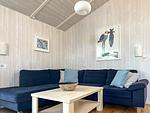 Wohnzimmer mit Sofa - Ferienhaus 07 - Top-Hundeurlaub