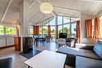 Wohnzimmer mit Blick zum Essbereich - Ferienhaus 23 - Top-Hundeurlaub