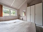 Doppelbett im ersten Schlafzimmer - Ferienhaus 23 - Top-Hundeurlaub