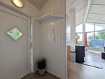 Eingangsbereich mit Blick zum Wohnzimmer - Ferienhaus 23 - Top-Hundeurlaub