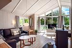 Wohnzimmer mit Kamin - Ferienhaus 08 - Top-Hundeurlaub