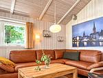 Wohnzimmer mit Sofaecke - Ferienhaus 14 - Top-Hundeurlaub