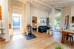 Wohnzimmer mit Kamin - Ferienhaus 15 - Top-Hundeurlaub