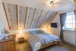 Ferienwohnung Mia, 1.OG Schlafzimmer - Ferienwohnung Mia, 1. OG - Top-Hundeurlaub
