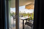 Wohnzimmer mit TV und Blick aufs Wasser - Heimathafen (48.2.S) - Top-Hundeurlaub