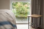Schlafzimmer mit Blick auf die Graft - Graftkieker (49.1.S) - Top-Hundeurlaub