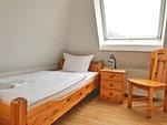 Schlafzimmer - Hafenhäuser Breege - Ferienwohnung 18 "Ankerplatz" - Top-Hundeurlaub