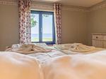 Schlafzimmer mit Blick auf die Ostsee - Küstenhof am Kap Arkona - Ferienhaushälfte "Königsmeerblick" - Top-Hundeurlaub