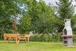 gemeinschaftlicher Grillbereich im Garten - Haus "Meeresbrise - Ferienwohnung 3  "Meeresrauschen" - Top-Hundeurlaub