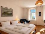 Schlafzimmer - Ferienhaus Am Ufer - Ferienwohnung Strandluft - Top-Hundeurlaub