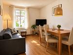 Wohnzimmer - Ferienhaus Am Ufer - Ferienwohnung Strandluft - Top-Hundeurlaub