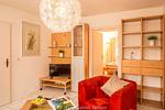 Wohnzimmer - Ferienhaus Am Ufer - Ferienwohnung Strandsand - Top-Hundeurlaub