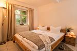 Schlafzimmer - Ferienhaus Am Ufer - Ferienwohnung Strandsand - Top-Hundeurlaub