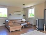 Wohnbereich mit Kamin - Ferienhaus "Sarcander" - Top-Hundeurlaub