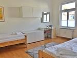 Schlafzimmer 2 mit zwei Einzelbetten - Haus Stothfang - Ferienwohnung 3 - Top-Hundeurlaub