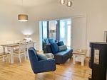 Wohnbereich mit Kamin - Villa Jenny - Appartement 2 - Top-Hundeurlaub