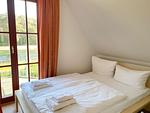 Schlafzimmer 2 - Ferienhaus am Leuchtturm - Top-Hundeurlaub