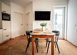 Wohnzimmer mit Essplatz - Villa Tizian -  Ferienappartement Hygge - Top-Hundeurlaub