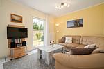 Ferienhaus Schwanensee Ferienpark Lenzer Höh Wohnbereich mit TV-Einheit - Schwanensee - Top-Hundeurlaub