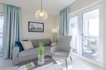 Ferienwohnung Stranddomizil Ostseebad Wustrow ZweiWasser Alte Seefahrtschule Gemütliches Wohnzimmer - Stranddomizil - Top-Hundeurlaub