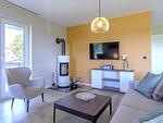 Ferienwohnung Strandliebe Ostseebad Wustrow ZweiWasser Alte Seefahrtschule Wohnzimmer mit Kamin - Strandliebe - Top-Hundeurlaub