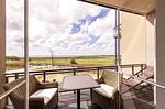 Ferienwohnung Kleine Welle Ostseebad Wustrow - Balkon mit Ausblick auf Boddenlandschaft - Kleine Welle - Top-Hundeurlaub