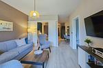 Ferienwohnung Kroonkieker Ostseebad Wustrow - ZweiWasser Alte Seefahrtschule Wohnzimmer mit TV - Kroonkieker - Top-Hundeurlaub