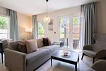 Ferienwohnung Seeluft Wustrow Wohnzimmer mit Terrassen Zugang - Seeluft - Top-Hundeurlaub