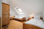 Ferienhaus Zander Fuenfseen Schlafzimmer mit 2 Betten im Obergeschoss - Zander - Top-Hundeurlaub