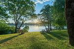 Ferienwohnung Schwan Blick auf das Grundstück und auf den Loppiner See - Schwan - Top-Hundeurlaub