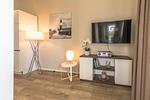 Ferienwohnung Sonnengott in Wustrow - Blick auf den TV im Wohnzimmer - Sonnengott - Top-Hundeurlaub