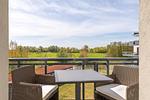 Ferienwohnung Sonnengott in Wustrow - Blick auf den Balkon mit Sitzmöbeln - Sonnengott - Top-Hundeurlaub