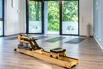 Apartment K15 Tao-Suite Krakow – moderner Yoga- und Fitnessraum mit hochwertigem Rudergerät - Waldkauz - Top-Hundeurlaub
