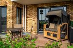 Ferienwohnung Fischotter Waren (Müritz) - Terrasse mit Strandkorb - Fischotter - Top-Hundeurlaub