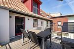 Ferienhaus Wasserblick Inselstadt Malchow - Obere Terrasse mit Tisch und Stühlen - Wasserblick - Top-Hundeurlaub
