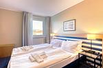 Ferienwohnung Ankerplatz Aparthotel Zingst - Schlafzimmer - Ankerplatz - Top-Hundeurlaub