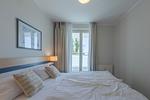 Ferienwohnung Bina Zingst - Schlafzimmer mit Ausblick auf Zingst - Bina - Top-Hundeurlaub