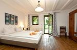 Ferienwohnung Gänseblume Waren (Müritz) - geräumiges Schlafzimmer mit Blick in den Garten - Gänseblume - Top-Hundeurlaub