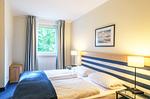 Ferienwohnung Seebär in Zingst - Schlafzimmer mit gemütlichem Doppelbett - Seebär - Top-Hundeurlaub