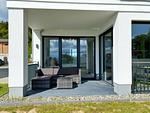 überdachte Terrasse mit Loungemöbeln Richtung Süd-West - Ferienwohnung Balve - Top-Hundeurlaub
