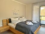 Schlafzimmer mit Doppelbett - Ferienappartement Nr. 14, Baumwipfelnest - Top-Hundeurlaub