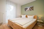 Ferienhaus Aurora Roebel Schlafzimmer im Erdgeschoss mit Boxspringbett - Aurora - Top-Hundeurlaub