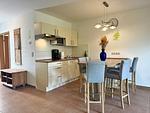 Wohnbereich mit integrierter Küche - Ferienwohnung im Reihenhaus Petermann 2 - Top-Hundeurlaub