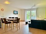 Wohnzimmer mit Essbereich - Ferienwohnung im Reihenhaus Petermann 4 - Top-Hundeurlaub