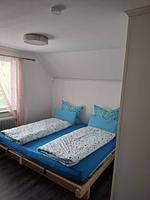 Schlafzimmer mit Doppelbett im Ferienhaus Nordic Heaven in Dalarna - Nordic Haven - Top-Hundeurlaub