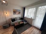 Nordlicht Ferienwohnung Sofa - Ferienwohnung NORDLICHT mit Balkon und Infrarotsauna - Top-Hundeurlaub