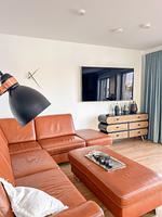 Wohnzimmer - Ferienhaus Seeperle Traumblick 7 - Top-Hundeurlaub