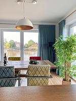 Wohnzimmer - Ferienhaus Seeperle Traumblick 7 - Top-Hundeurlaub
