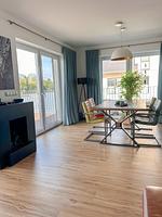 Wohnzimmer - Ferienhaus Seeperle Traumblick 7 - Top-Hundeurlaub