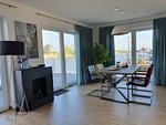 Wohnzimmer - Ferienhaus Seeperle Traumblick 7 - Top-Hundeurlaub